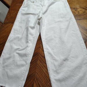 women's jean, with ripped hem